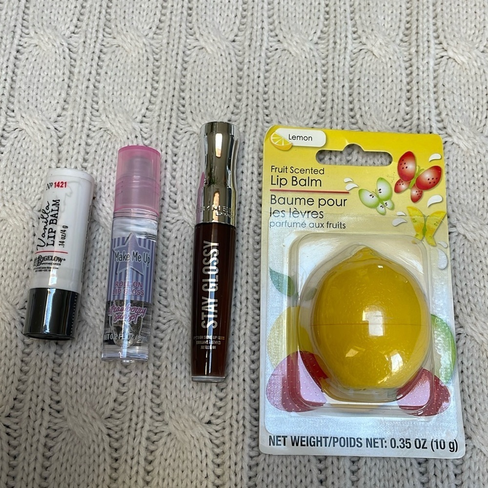 New Unused Lip gloss/balms lot of 4. Vanilla strawberry burst cocoa kiss lemon